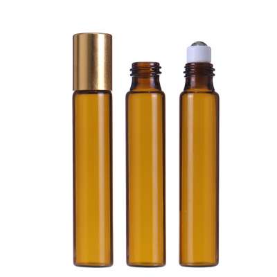 Custom wholesale 5ml 10ml essential oil glass roller perfume bottle roll on gemstone roller bottle with gold cap